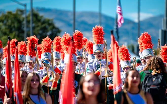 La CSU Marching Band se presenta durante la Ram Walk durante el partido de fútbol del Ag Day contra Utah Tech el sábado 30 de septiembre de 2023 en el Canvas Stadium.